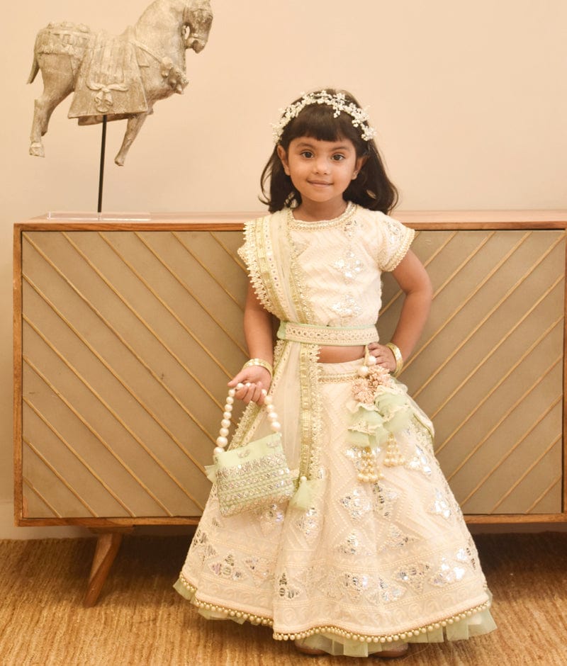 Manufactured by FAYON KIDS (Noida, U.P) Off White Thread and Gota Embroidery Lehenga Choli with Green Frll for Girls