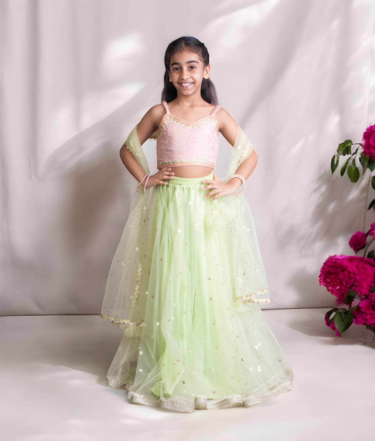 Manufactured by FAYON KIDS (Noida, U.P) Peach Brocade Choli with Green Lehenga