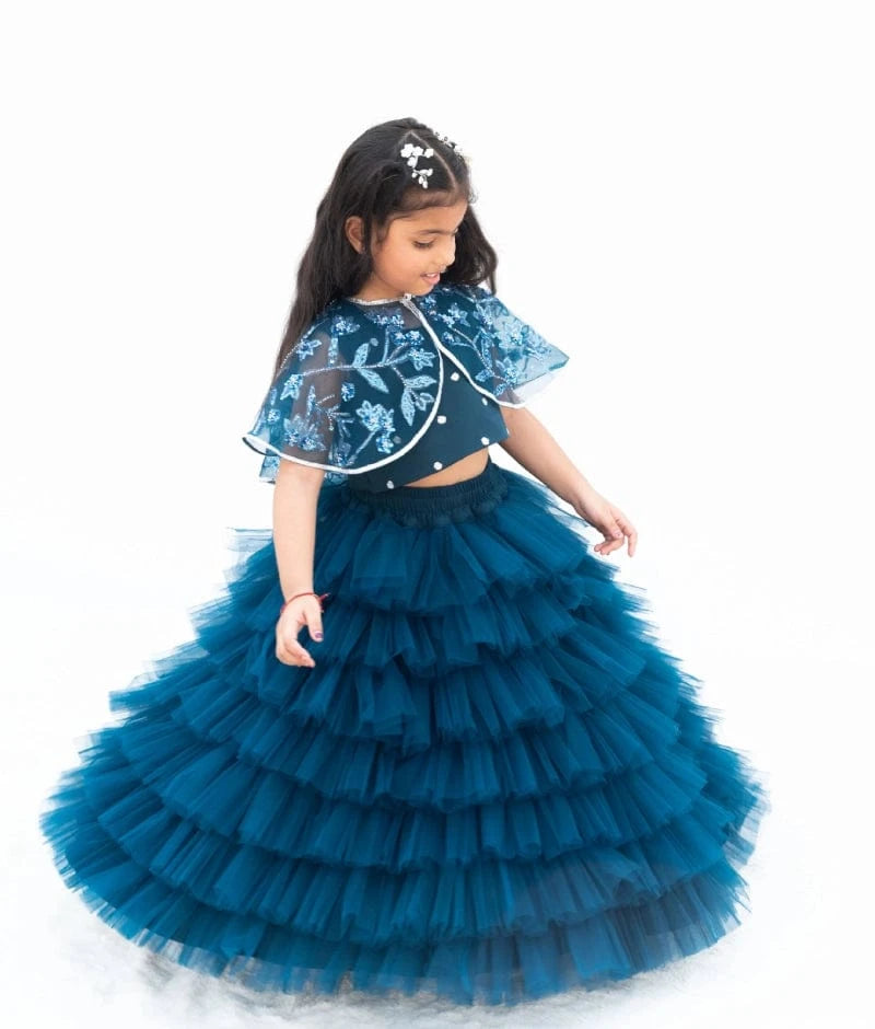 Manufactured by FAYON KIDS (Noida, U.P) Teal Blue Elegance: Crop Top Skirt with Embroidered Cape