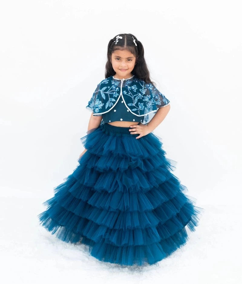 Manufactured by FAYON KIDS (Noida, U.P) Teal Blue Elegance: Crop Top Skirt with Embroidered Cape