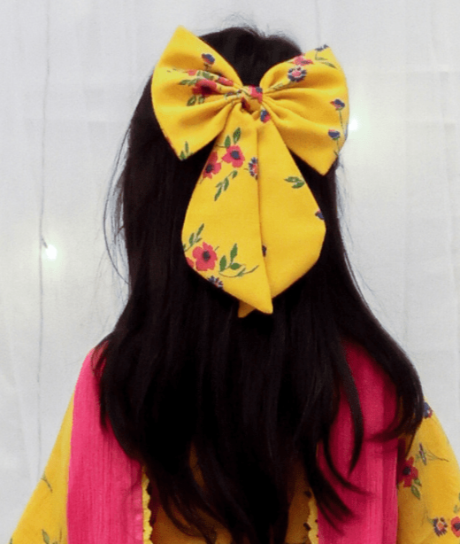 Manufactured by FAYON KIDS (Noida, U.P) Yellow Printed Bow Clip
