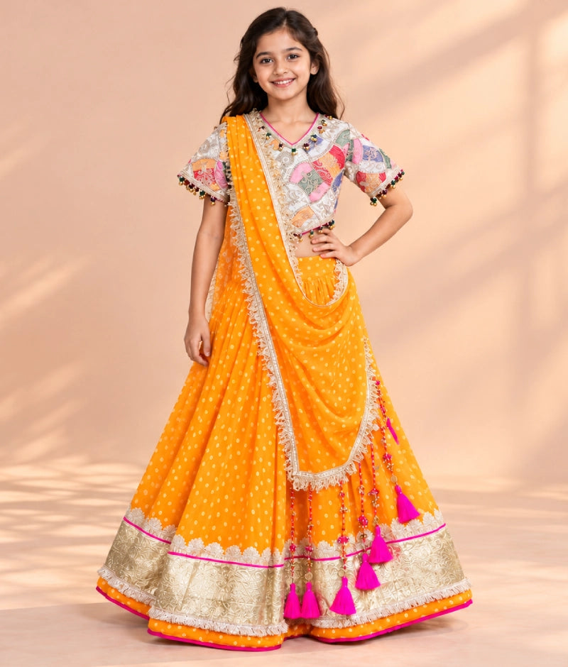 Offwhite Embroidered Choli with Orange Bandhej Lehenga