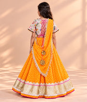 Offwhite Embroidered Choli with Orange Bandhej Lehenga