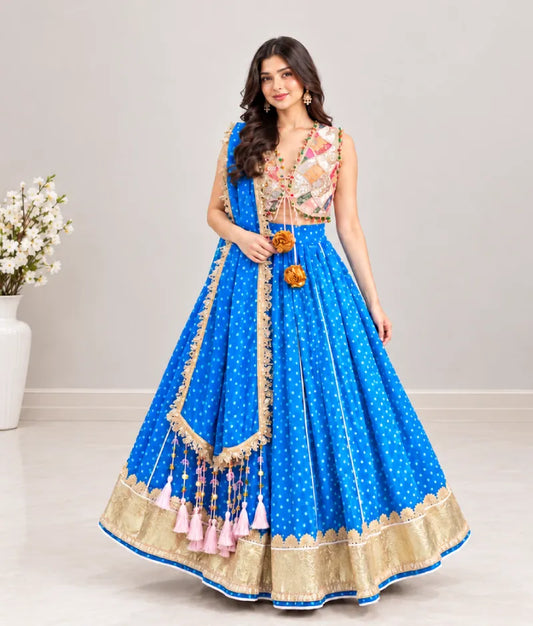 Offwhite Embroidered Choli with Blue Bandhej Lehenga