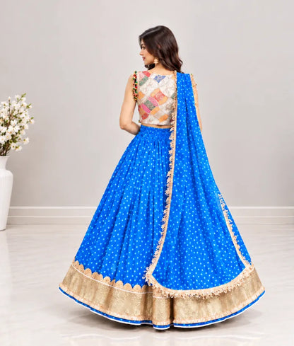 Offwhite Embroidered Choli with Blue Bandhej Lehenga