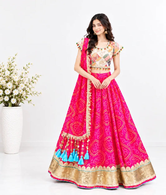Offwhite Embroidered Choli with Coral Bandhej Lehenga