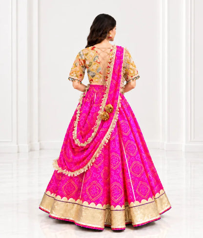 Mustard Embroidered Choli with Pink Bandhej Lehenga