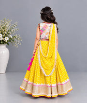 Luxe Offwhite Embroidered Choli with Yellow Bandhej Lehenga