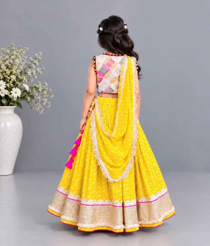 Luxe Offwhite Embroidered Choli with Yellow Bandhej Lehenga