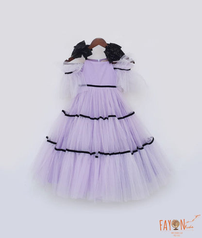 Manufactured by FAYON KIDS (Noida, U.P) Lilac Net Gown with Black Bow for Girls
