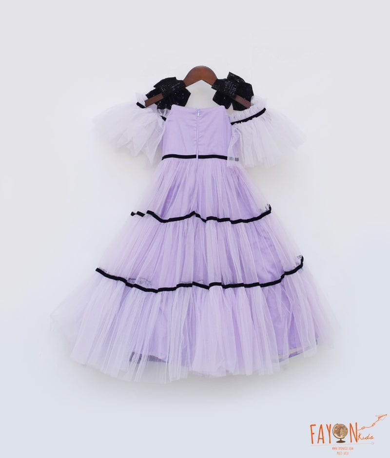 Manufactured by FAYON KIDS (Noida, U.P) Lilac Net Gown with Black Bow for Girls