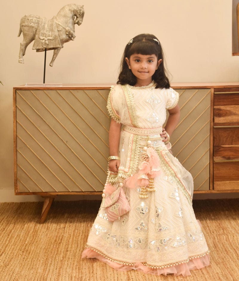 Manufactured by FAYON KIDS (Noida, U.P) Off White Thread and Gota Embroidery Lehenga Choli with Peach Frll for Girls