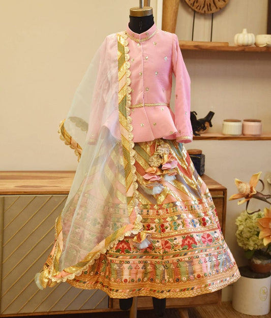 Manufactured by FAYON KIDS (Noida, U.P) Pink Velvet Peplum Top with Embroidrred Lehenga
