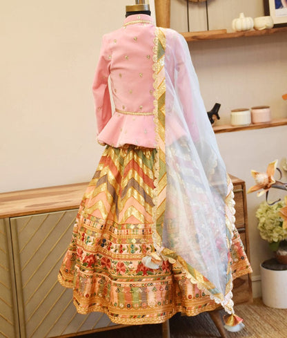 Manufactured by FAYON KIDS (Noida, U.P) Pink Velvet Peplum Top with Embroidrred Lehenga