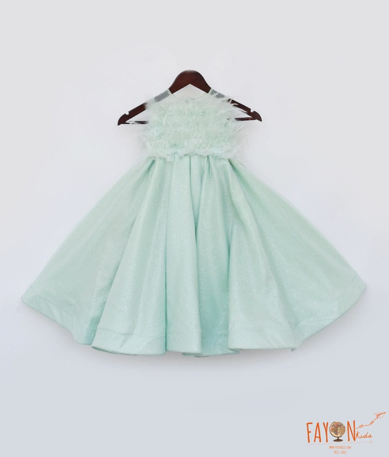 Manufactured by FAYON KIDS (Noida, U.P) Pista Green Gown with Fur on Yoke for Girls