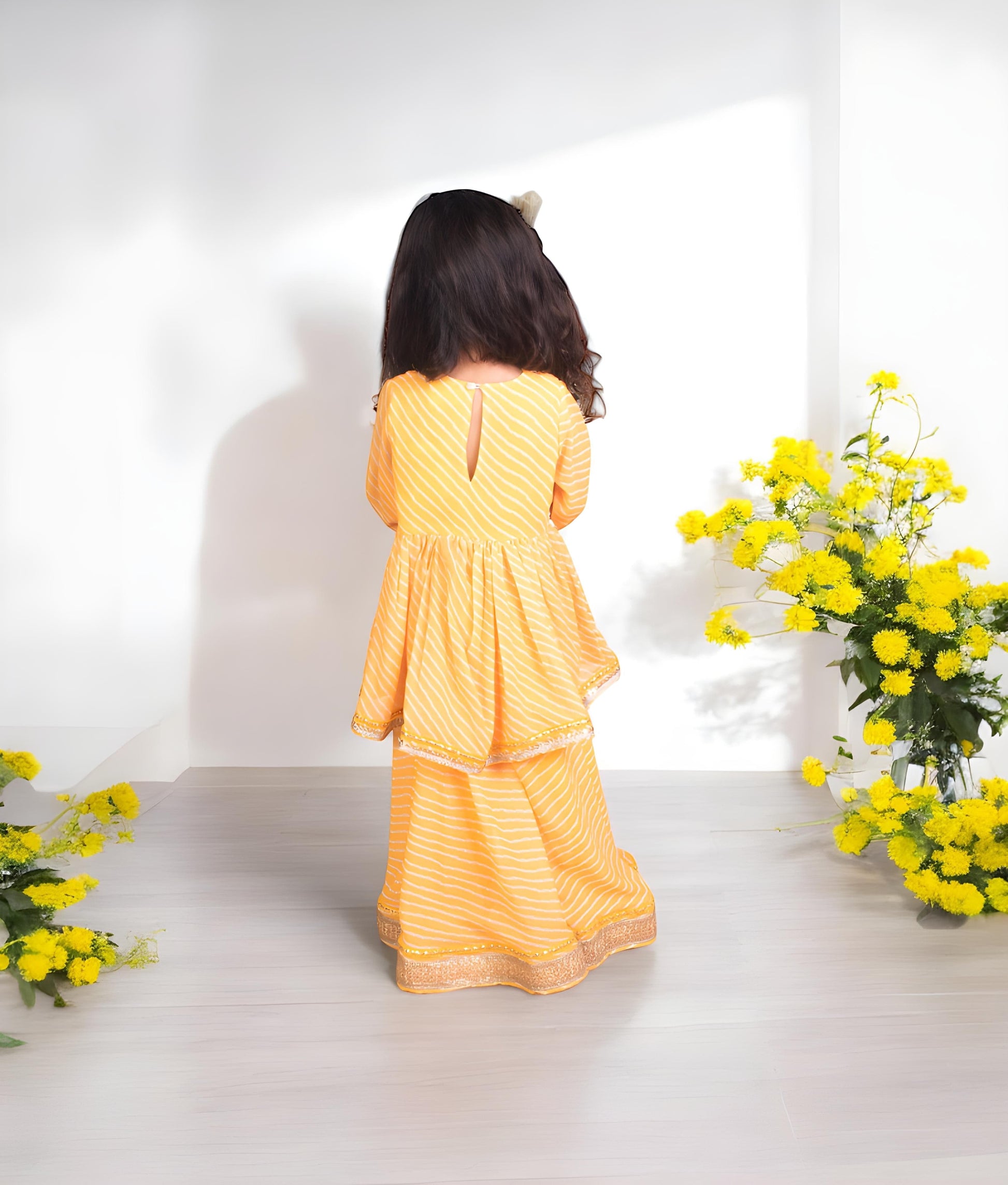 Manufactured by FAYON KIDS (Noida, U.P) Yellow Bandhej Peplum Kurti with Bandhej Sharara
