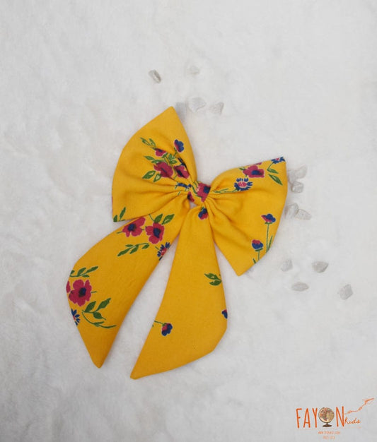 Manufactured by FAYON KIDS (Noida, U.P) Yellow Printed Bow Clip for Girls